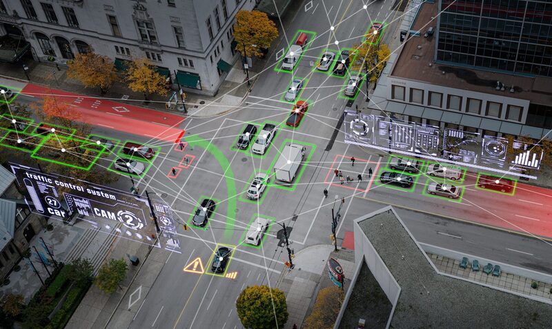 Ampelkreuzung. Ein Liniennetz simuliert die Verbindung der einzelnen Verkehrsteilnehmer für eine optimale Verkehrsführung.